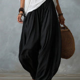 Ensemble haut blanc à épaules dénudées et pantalon évasé style lanterne