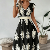 Candela - Vestido maxi barroco con escote en V